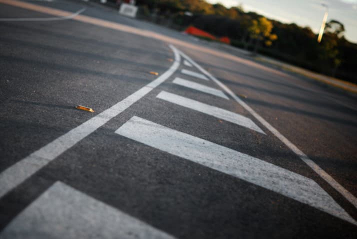 page background showing lines on a road
